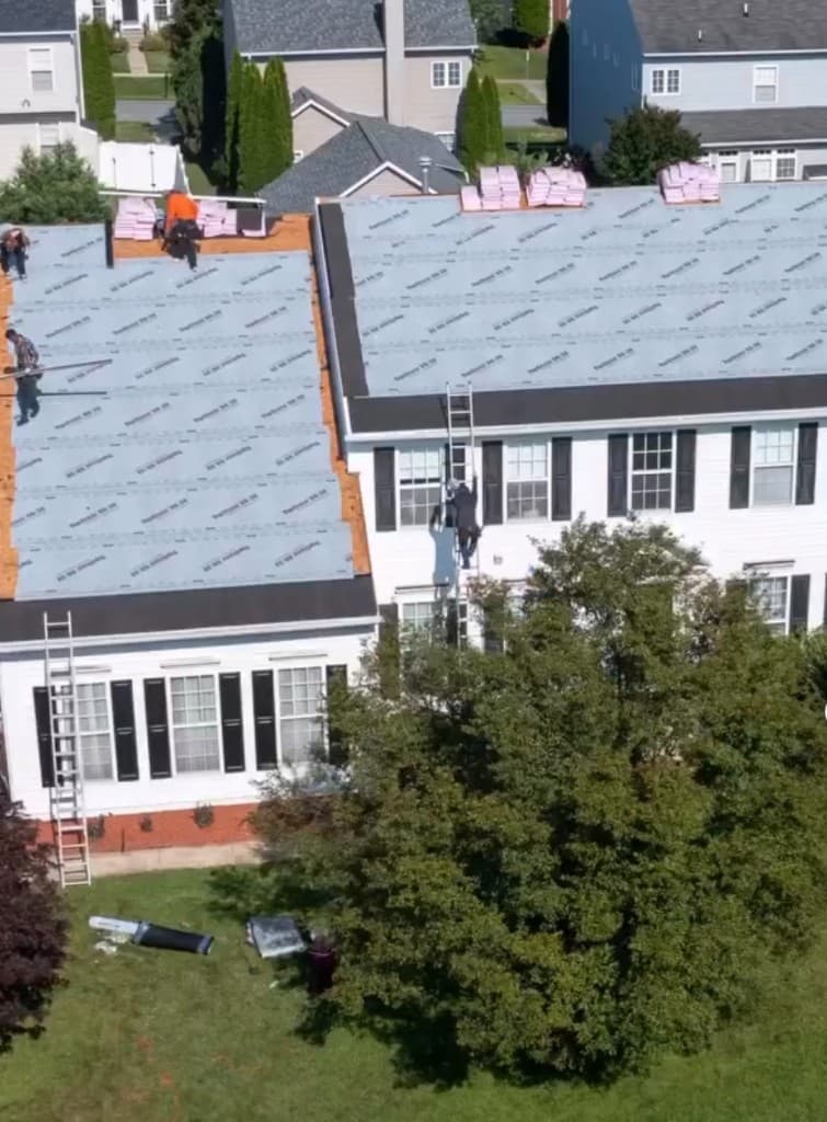 Commercial roofing work by New Paradigm Projects